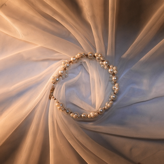 Serpent Elegance Bracelet – White & Golden Pearl Design