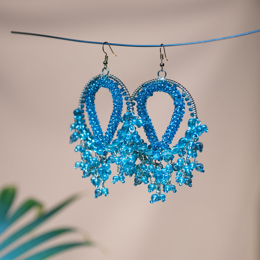 Turquise Beade With Golden Metal Fram Wrapp Sring Inside Over Fram Earring